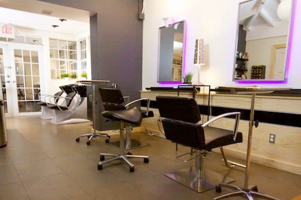 Hair color and styling stations inside McAllister Spa's Miami Beach hair salon